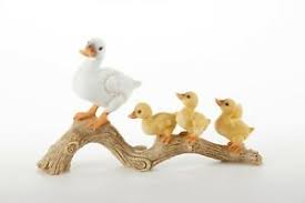 Resin Duck Family on Branch